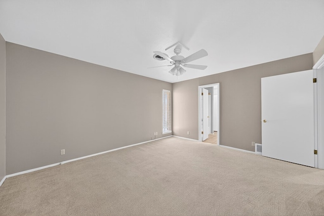 1406 W Pecan, Midland, TX 79705 - unfurnished bedroom featuring light carpet and ceiling fan