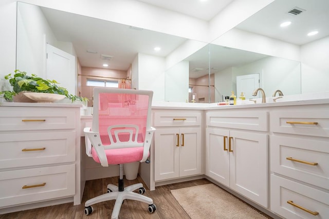 5807 Sterling Pl, Midland, TX 79707 - full bath featuring wood finished floors and vanity