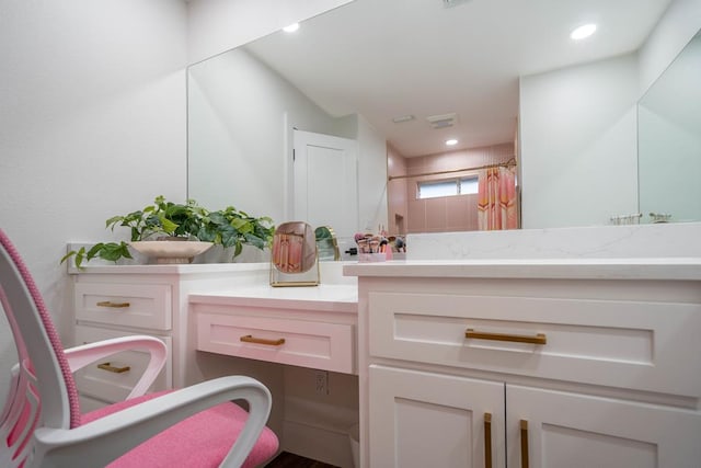 5807 Sterling Pl, Midland, TX 79707 - full bathroom featuring double vanity, a shower with shower curtain, and recessed lighting