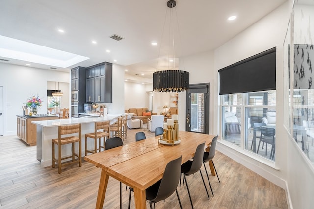 5807 Sterling Pl, Midland, TX 79707 - dining space with light wood-type flooring and recessed lighting
