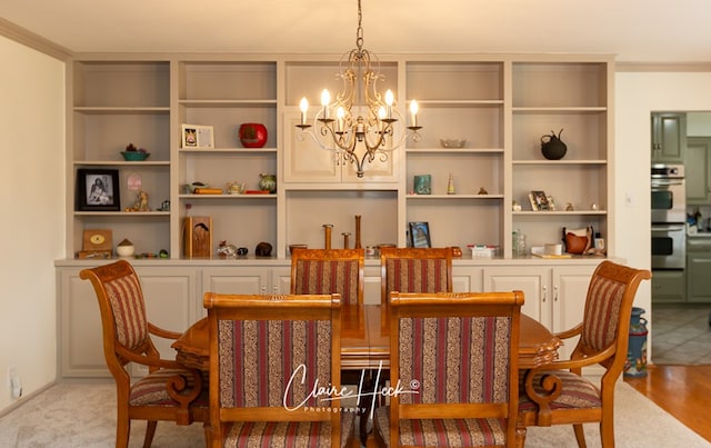 dining area with an inviting chandelier