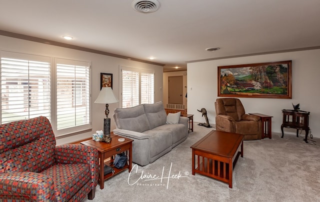 living area featuring ornamental molding, carpet flooring, visible vents, and recessed lighting