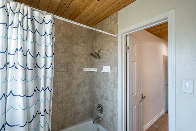 bathroom featuring shower / bath combination with curtain and wood ceiling