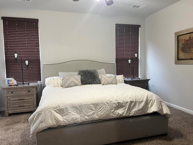 bedroom featuring carpet, visible vents, and baseboards