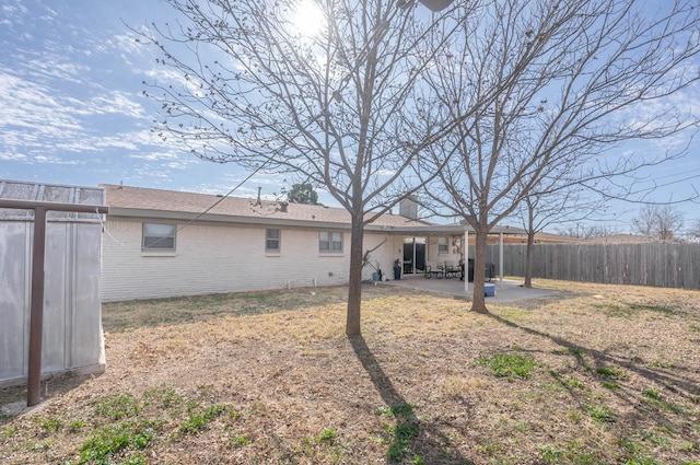 back of house featuring a patio area