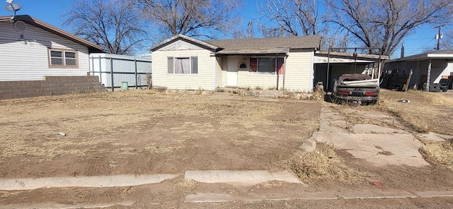 view of front of house featuring a carport