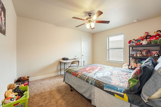 bedroom featuring ceiling fan, carpet floors, and baseboards