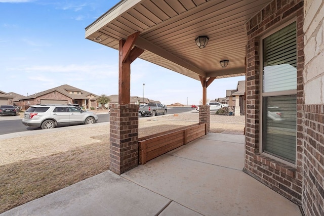 view of patio with a residential view