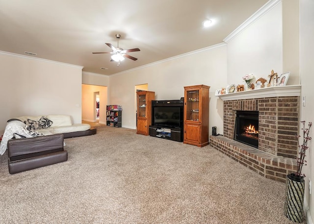 carpeted living area with ceiling fan, a fireplace, ornamental molding, and visible vents