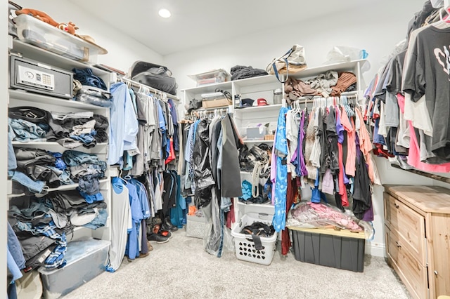 1706 Overshine Ln, Midland, TX 79705 - walk in closet featuring carpet floors