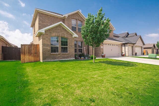 1706 Overshine Ln, Midland, TX 79705 - traditional home with brick siding, a garage, and driveway