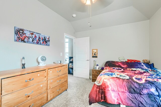 1706 Overshine Ln, Midland, TX 79705 - bedroom featuring light colored carpet, vaulted ceiling, and ceiling fan