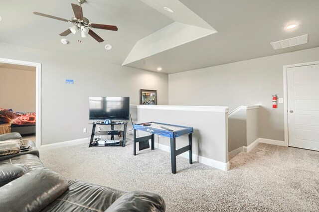 1706 Overshine Ln, Midland, TX 79705 - carpeted living area featuring ceiling fan, baseboards, lofted ceiling, and recessed lighting