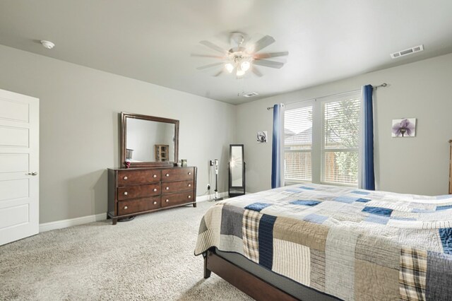 1706 Overshine Ln, Midland, TX 79705 - bedroom with baseboards, carpet flooring, and a ceiling fan