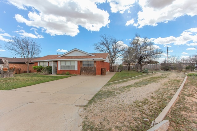 ranch-style house with a front lawn