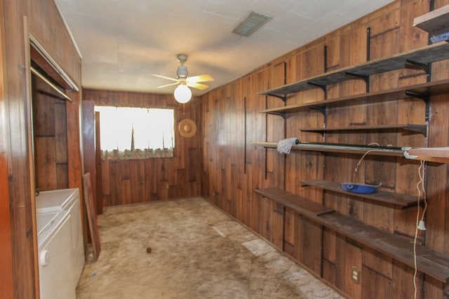 storage with ceiling fan and washer and dryer