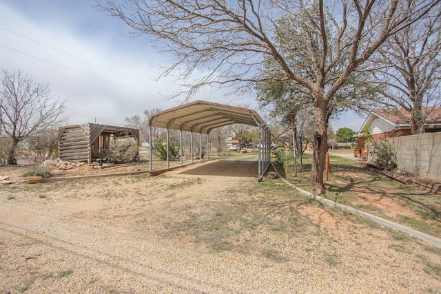 view of yard featuring a carport