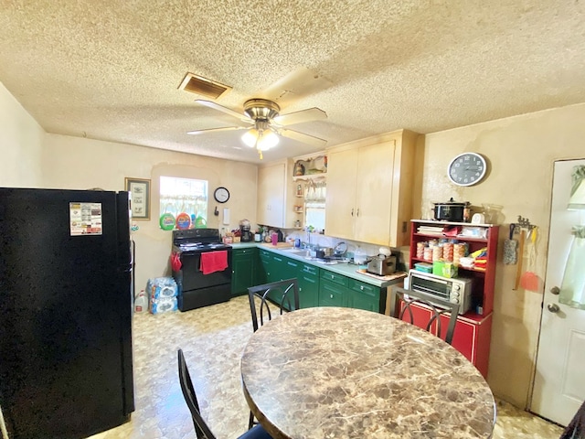 kitchen with a textured ceiling, ceiling fan, green cabinets, and black appliances