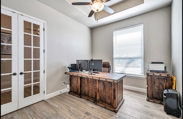 313 Peregrine Hill Cir, Midland, TX 79707 - office area with french doors, baseboards, a ceiling fan, and light wood finished floors
