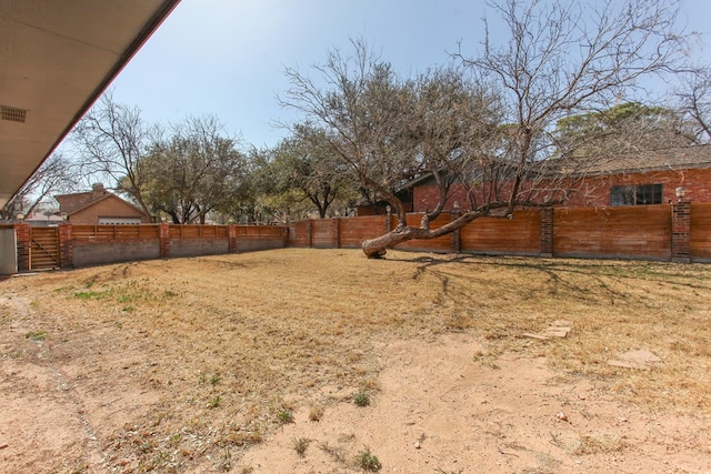 view of yard with fence