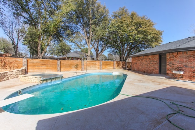 view of pool featuring a fenced backyard, a fenced in pool, and a patio