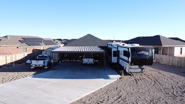 exterior space with a carport