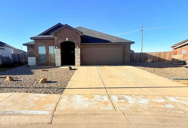 view of front of home with a garage