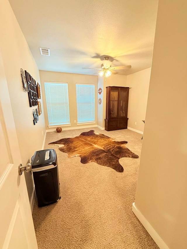 bedroom featuring carpet and ceiling fan