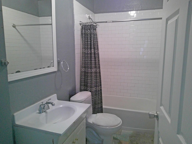 full bathroom featuring toilet, vanity, and shower / bath combo with shower curtain