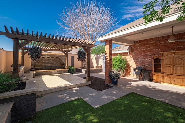 view of patio / terrace with a pergola and a fenced backyard