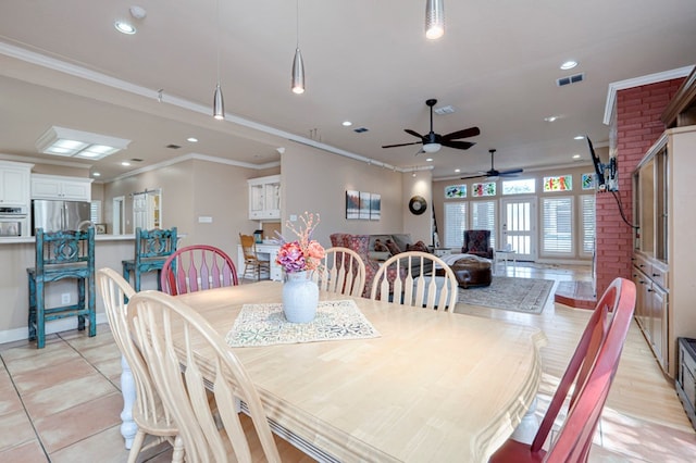 dining space with visible vents, crown molding, ceiling fan, and recessed lighting