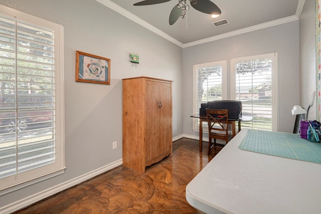 office space featuring a ceiling fan, baseboards, wood finished floors, visible vents, and ornamental molding