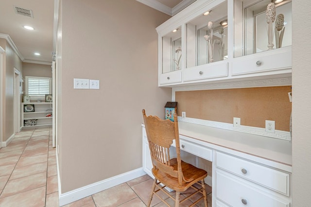 office area featuring baseboards, visible vents, ornamental molding, and light tile patterned floors