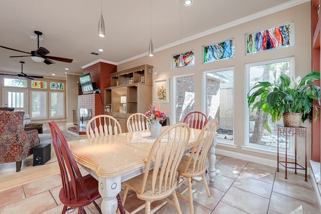 dining room featuring crown molding, ceiling fan, recessed lighting, light tile patterned floors, and visible vents