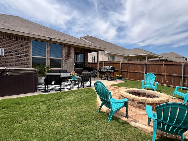 8409 E County Rd 113, Midland, TX 79706 - view of yard featuring a hot tub, a patio, central AC unit, and an outdoor living space with a fire pit