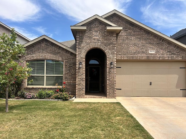 8409 E County Rd 113, Midland, TX 79706 - french provincial home with brick siding, a front lawn, a garage, and driveway