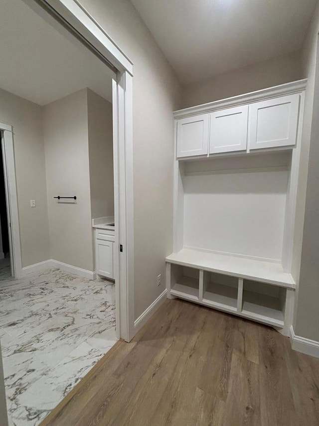 5605 E County Rd 94, Midland, TX 79706 - mudroom with baseboards