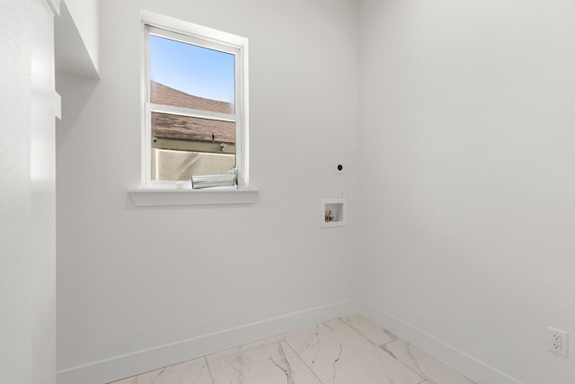 2607 Hoya Dr, Midland, TX 79707 - laundry area with marble look tiles, electric dryer hookup, and washer hookup