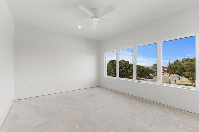 2607 Hoya Dr, Midland, TX 79707 - spare room with a ceiling fan, recessed lighting, and concrete floors