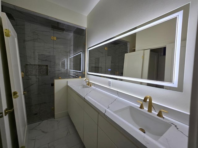 2607 Hoya Dr, Midland, TX 79707 - full bath with marble finish floors, double vanity, and a marble finish shower
