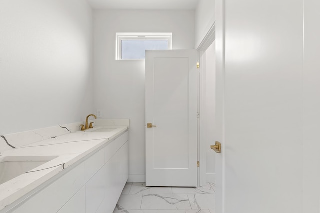 2607 Hoya Dr, Midland, TX 79707 - bathroom with marble finish flooring and double vanity
