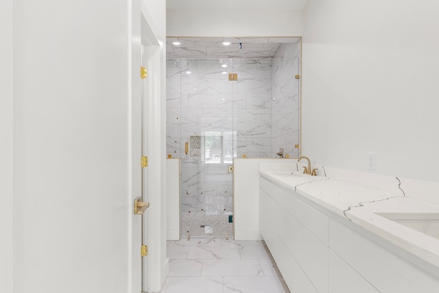 2607 Hoya Dr, Midland, TX 79707 - bathroom featuring marble finish flooring, a marble finish shower, and double vanity