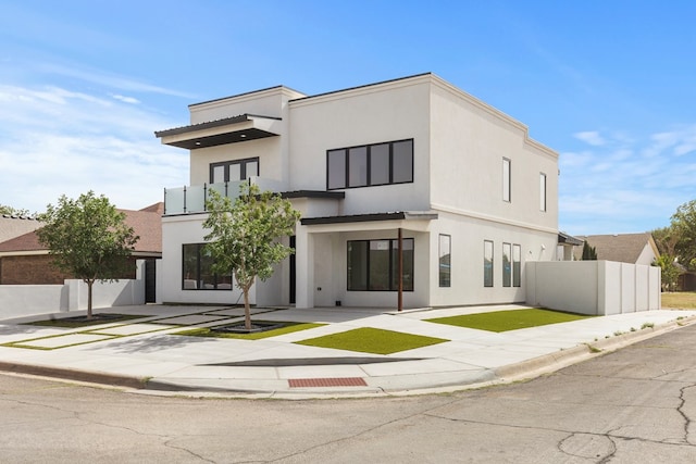 2607 Hoya Dr, Midland, TX 79707 - view of front of house with stucco siding and a patio area