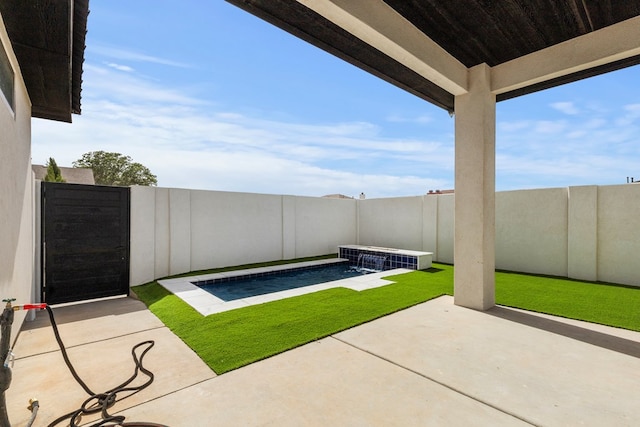2607 Hoya Dr, Midland, TX 79707 - fenced backyard with a patio