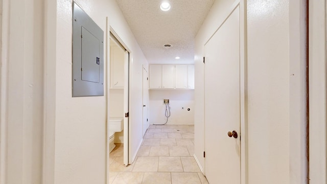 1007 Shirley Ln, Midland, TX 79705 - corridor featuring electric panel, recessed lighting, light tile patterned floors, and a textured ceiling