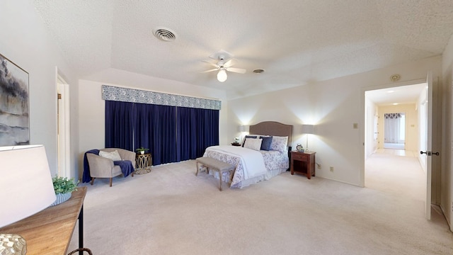 1007 Shirley Ln, Midland, TX 79705 - carpeted bedroom featuring a textured ceiling and a ceiling fan