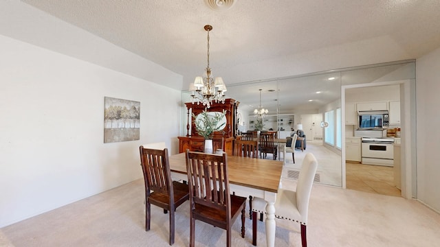 1007 Shirley Ln, Midland, TX 79705 - dining space featuring a chandelier and light colored carpet