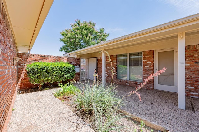1007 Shirley Ln, Midland, TX 79705 - doorway to property with brick siding