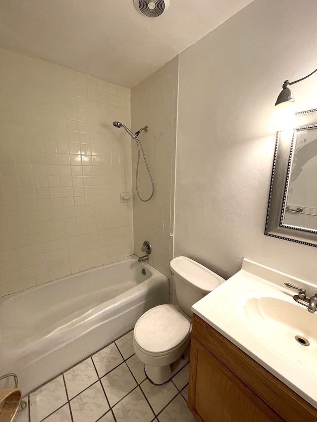 full bath featuring shower / washtub combination, visible vents, toilet, vanity, and tile patterned flooring