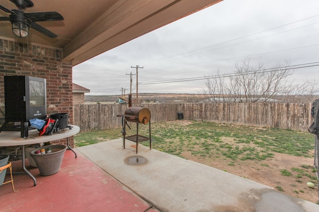 view of patio / terrace featuring ceiling fan